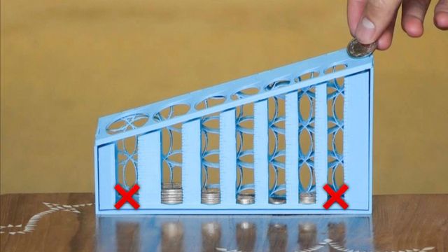 Coin-sorter, with empty columns crossed out