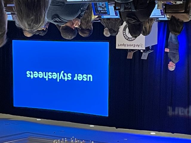 Jeremy Keith on stage
next to a slide that says
User Stylesheets
