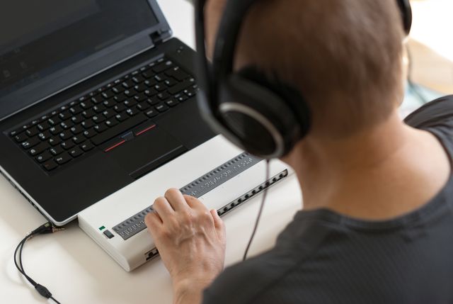 Braille interface and headphones