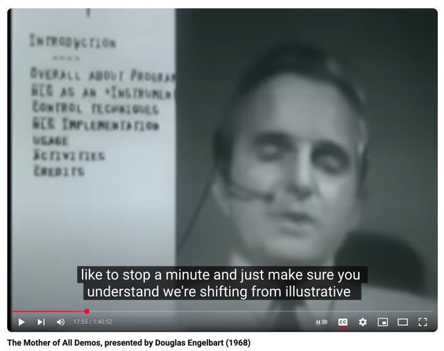 Black and white youtube still of a man with text superimposed
