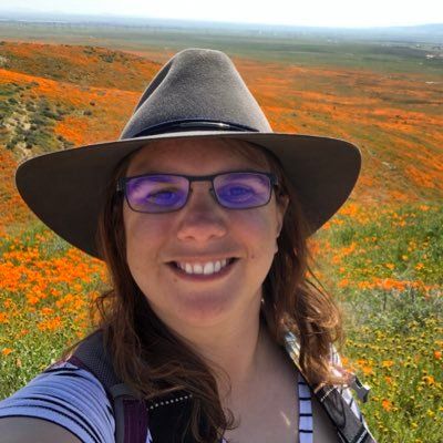 Headshot of **Natalie** Downe
