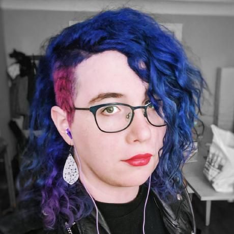 Headshot of **Natalie** Weizenbaum
