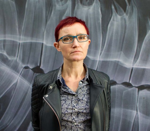 Headshot of **Rachel** Andrew
