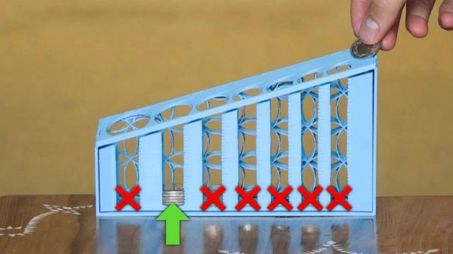 Coin-sorter, all but the largest column crossed out