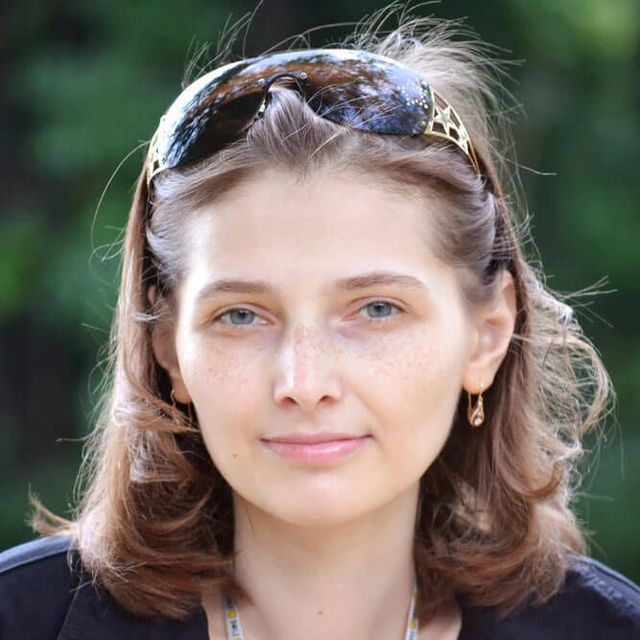 Headshot of **Ana** Tudor
